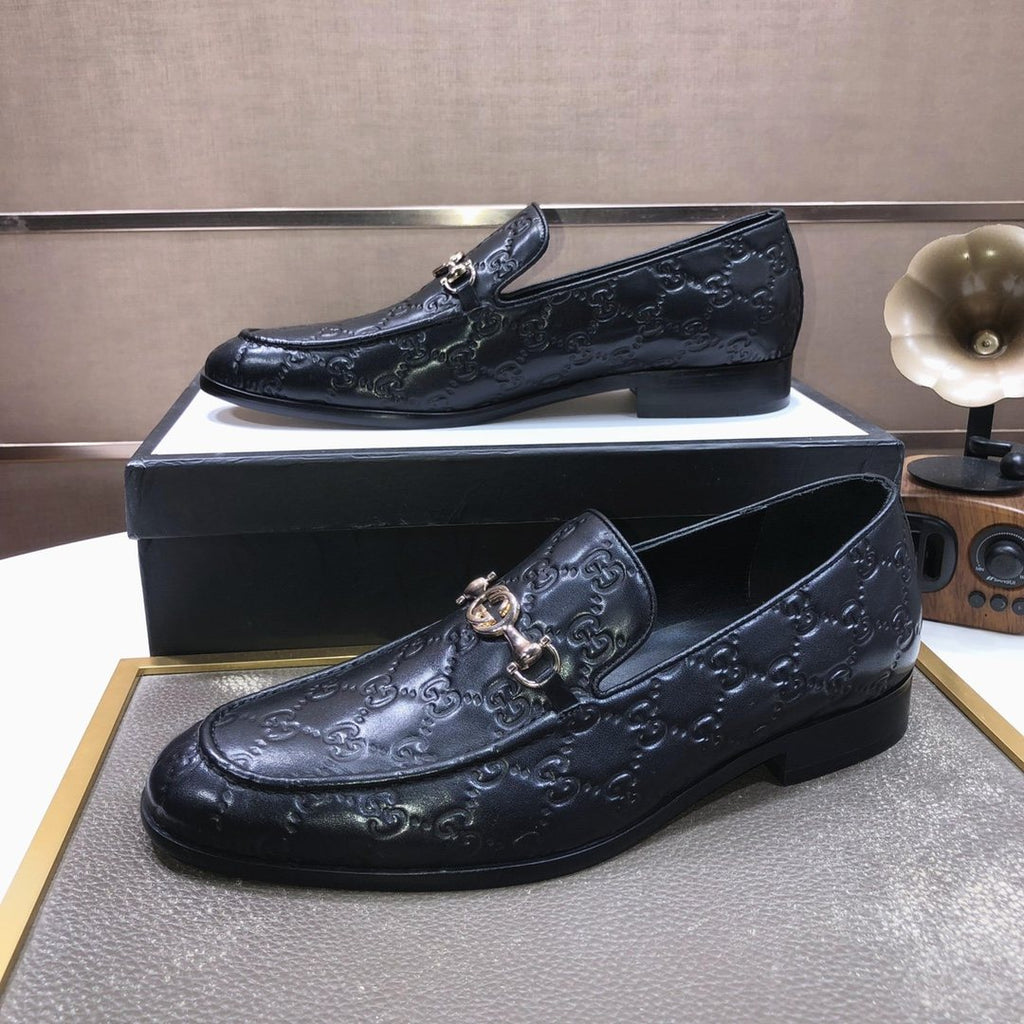 GUCCI Black Embossed Horsebit Loafers — front