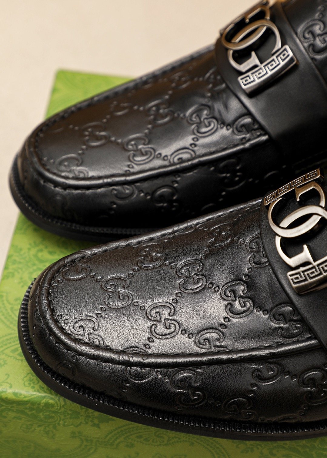 GUCCI Black Embossed Leather Loafers — detail