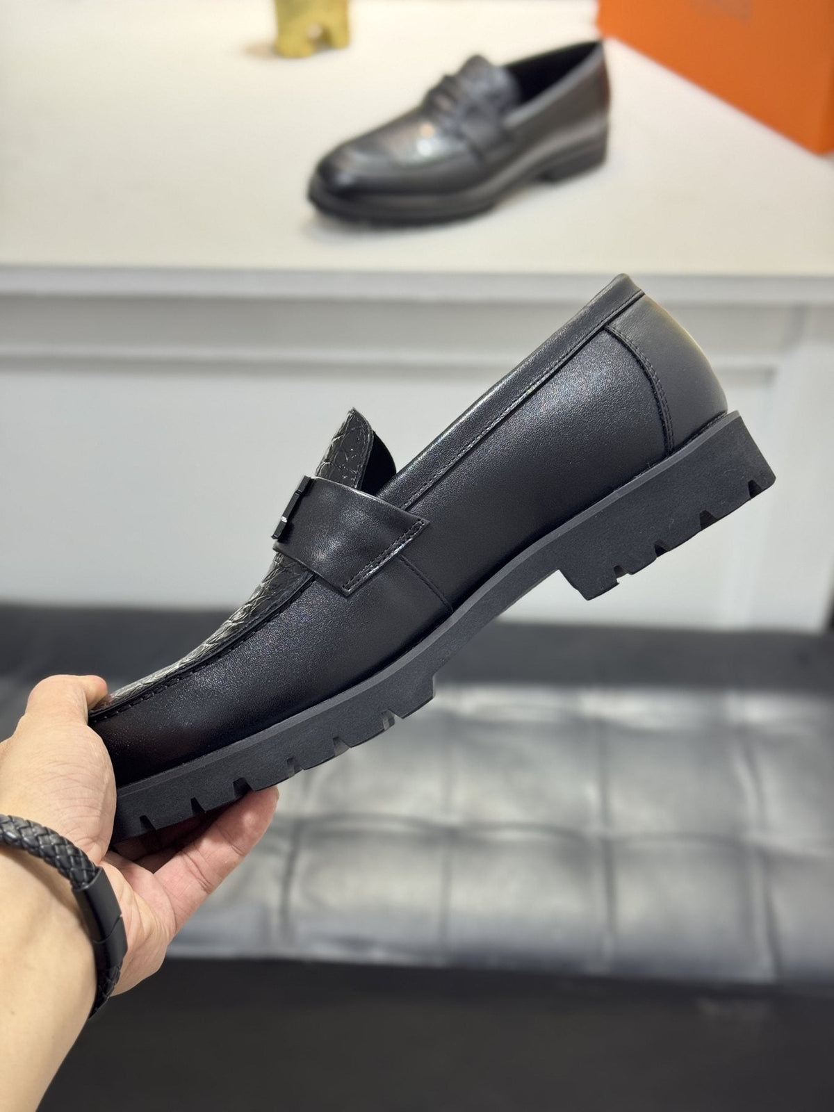 Hermès Black Knot Lug Sole Loafers — side