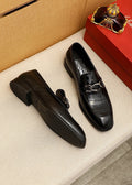 Ferragamo Black Embossed Bit Loafers — hero