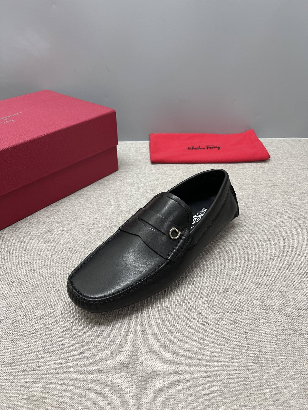 Ferragamo Black Buckle Loafers — front