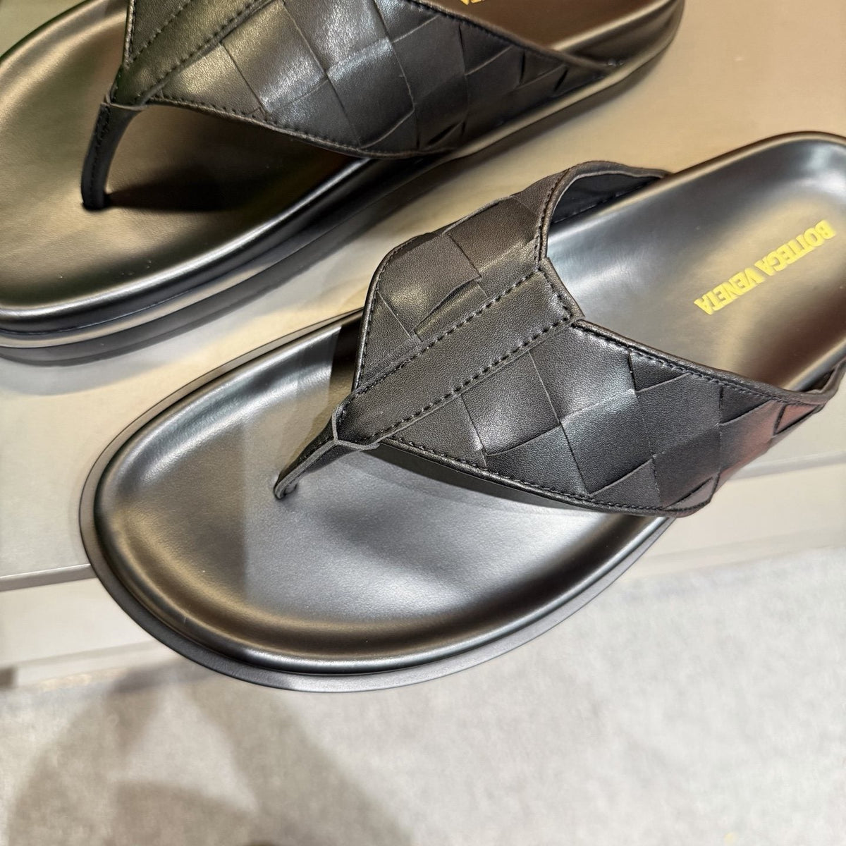 Bottega Veneta Black Woven Thong Sandals — front
