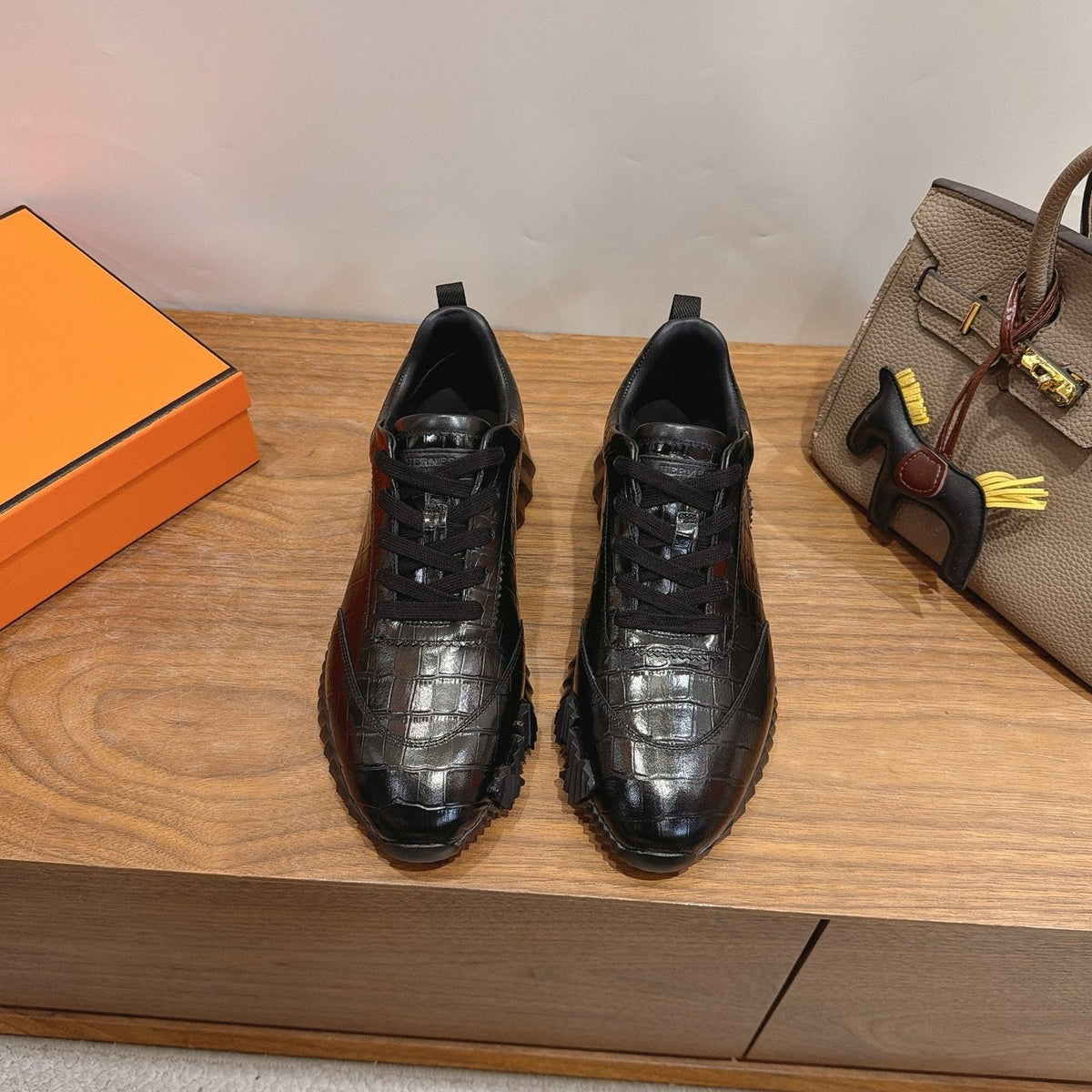 Hermès Black Textured Low-Top Sneakers — front