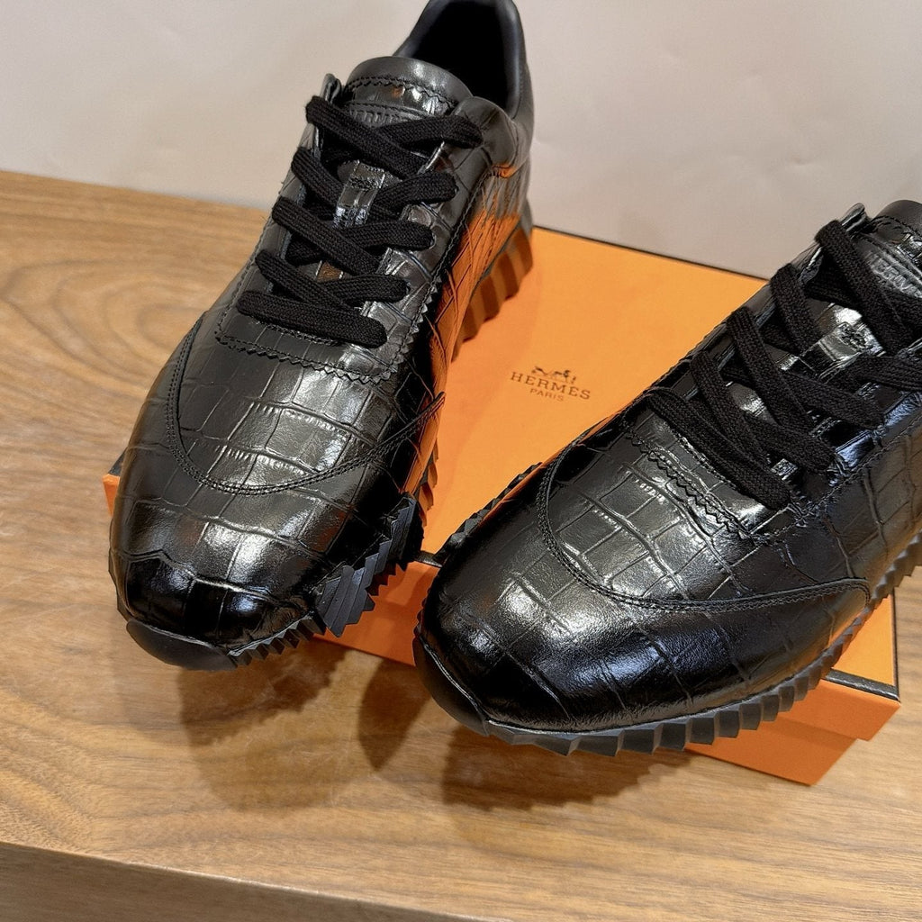 Hermès Black Textured Low-Top Sneakers — detail