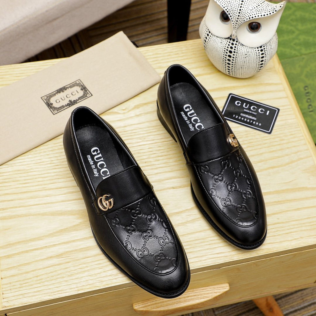 Gucci Black Embossed Hardware Loafers — front