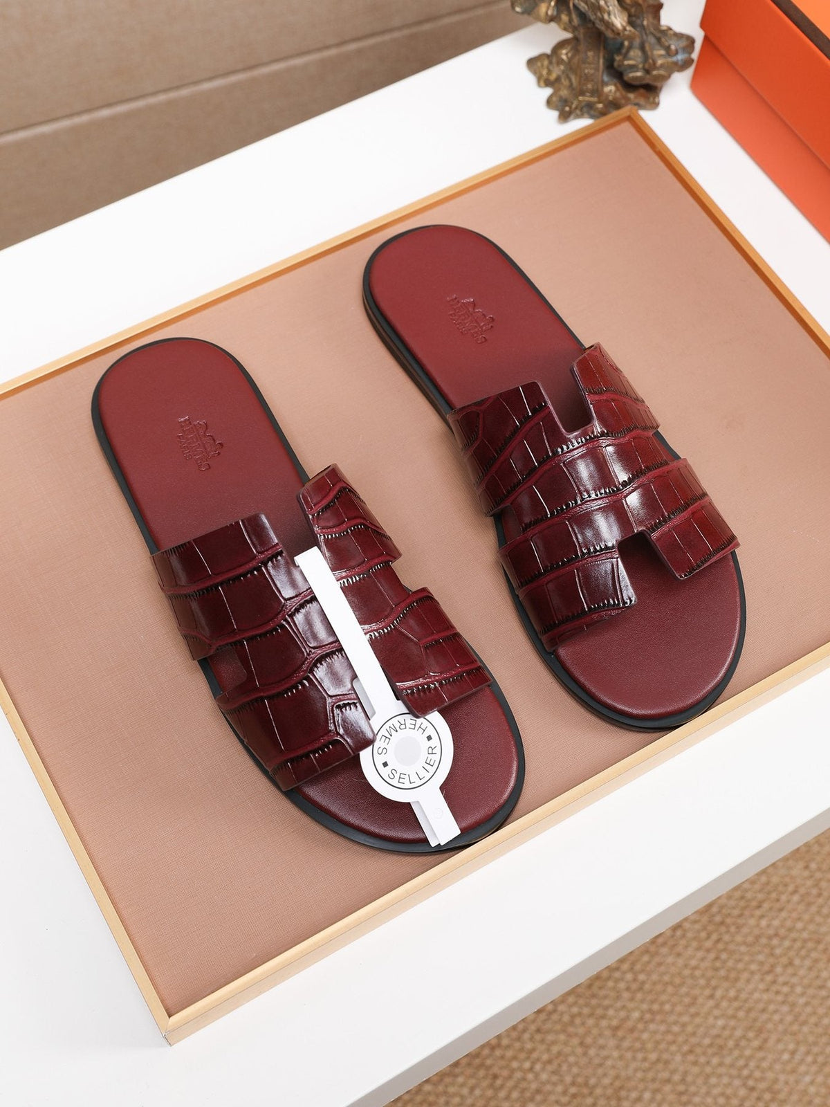 Hermès Burgundy Textured H Slide Sandals — front