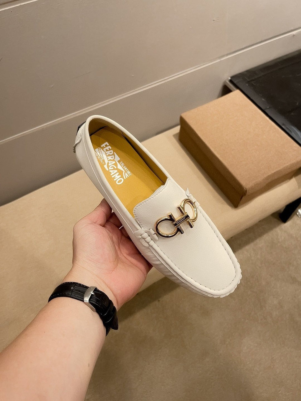 Ferragamo White Hardware Loafers — front