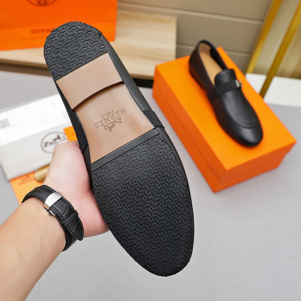 Hermès Black Pebbled Leather H-Hardware Loafers — front