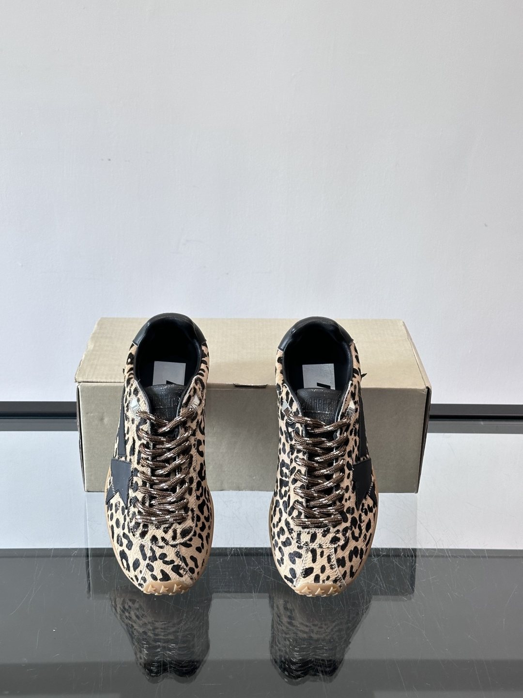 Golden Goose Leopard Print Star Sneakers — front