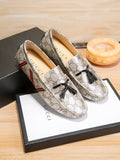 Gucci Monogram Stripe Tassel Loafers — hero