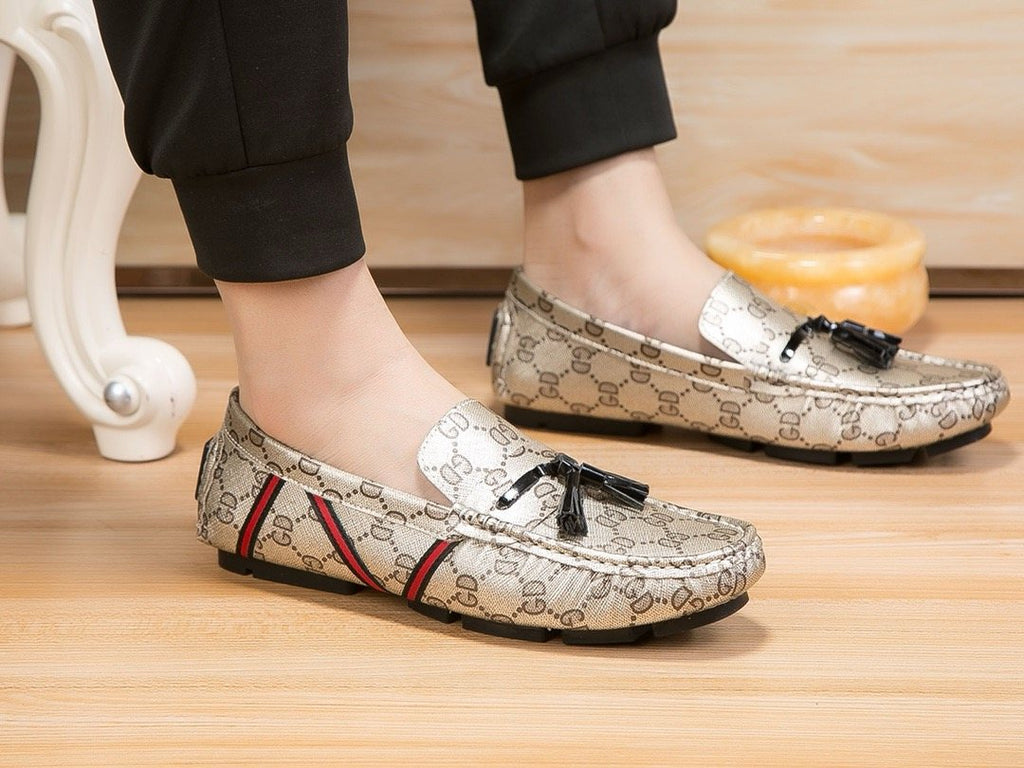 Gucci Monogram Stripe Tassel Loafers — model