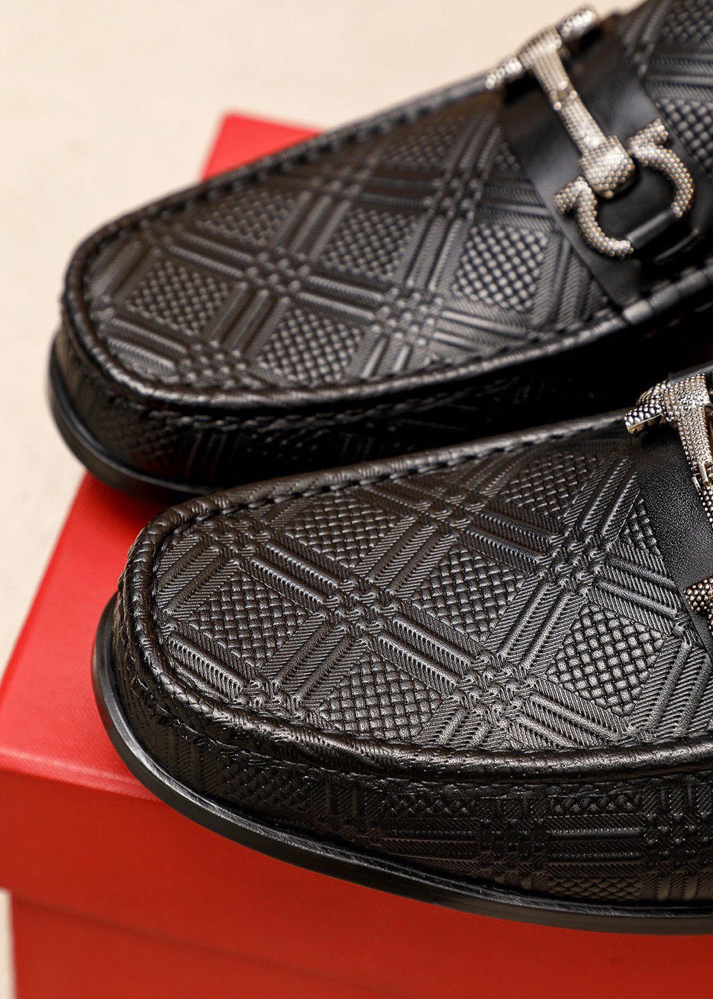 Ferragamo Black Embossed Buckle Loafers — detail
