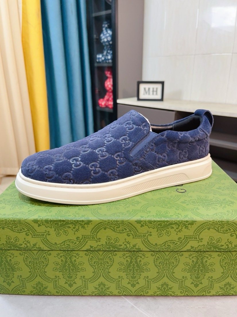 Gucci Embossed Slip-On Sneakers — front