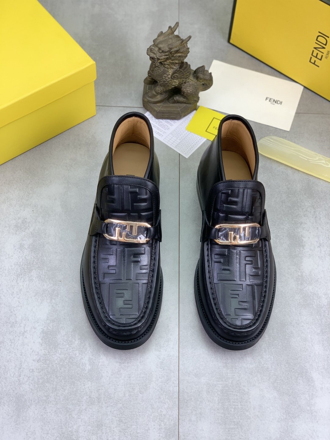 Fendi Embossed Metal-Hardware Slip-On Boots — front