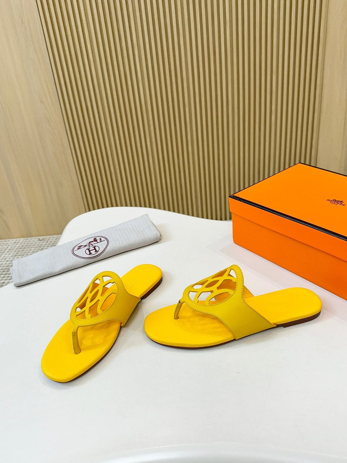 Hermès Cutout Strap Thong Sandals — side