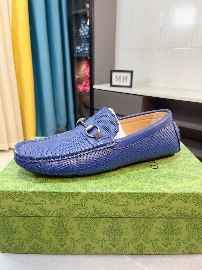 Gucci Perforated Metal Hardware Loafers — front