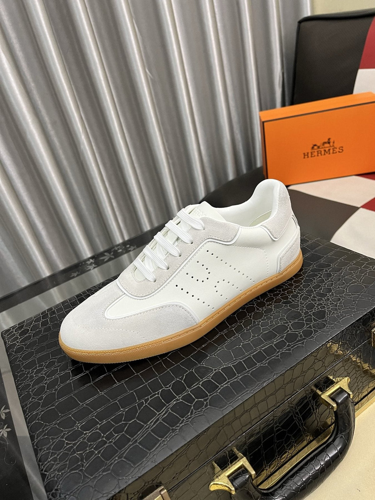 Hermès Perforated Low-Top Sneakers — front