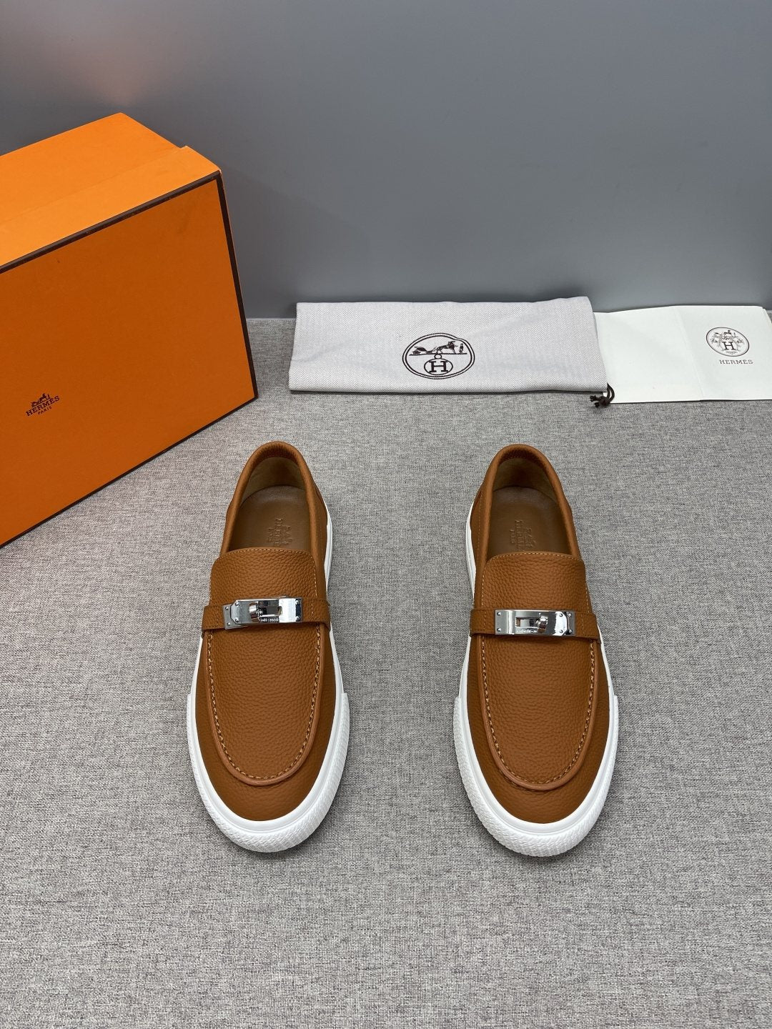 Hermès Textured Bar Loafers — front