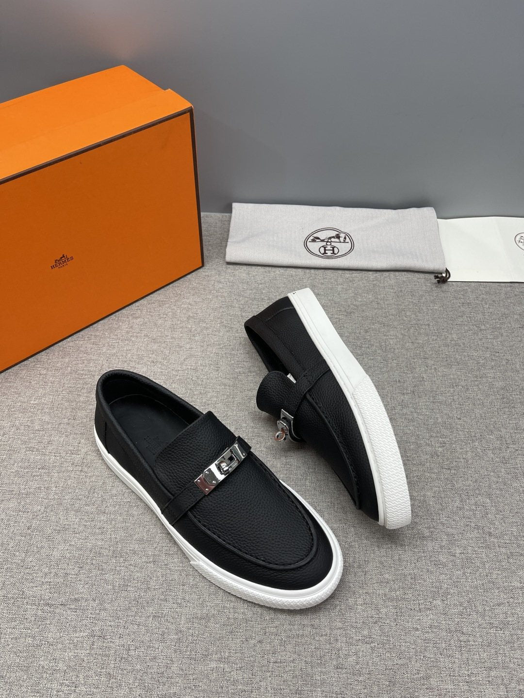 Hermès Textured Bar Loafers — side