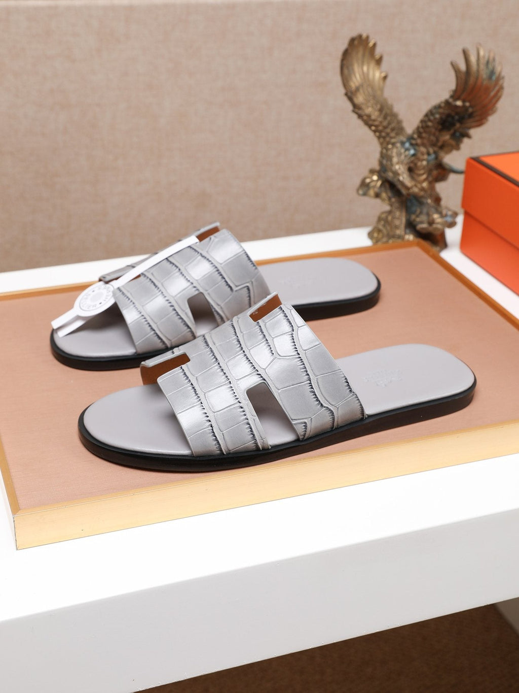 Hermes Textured H Slide Sandals — side