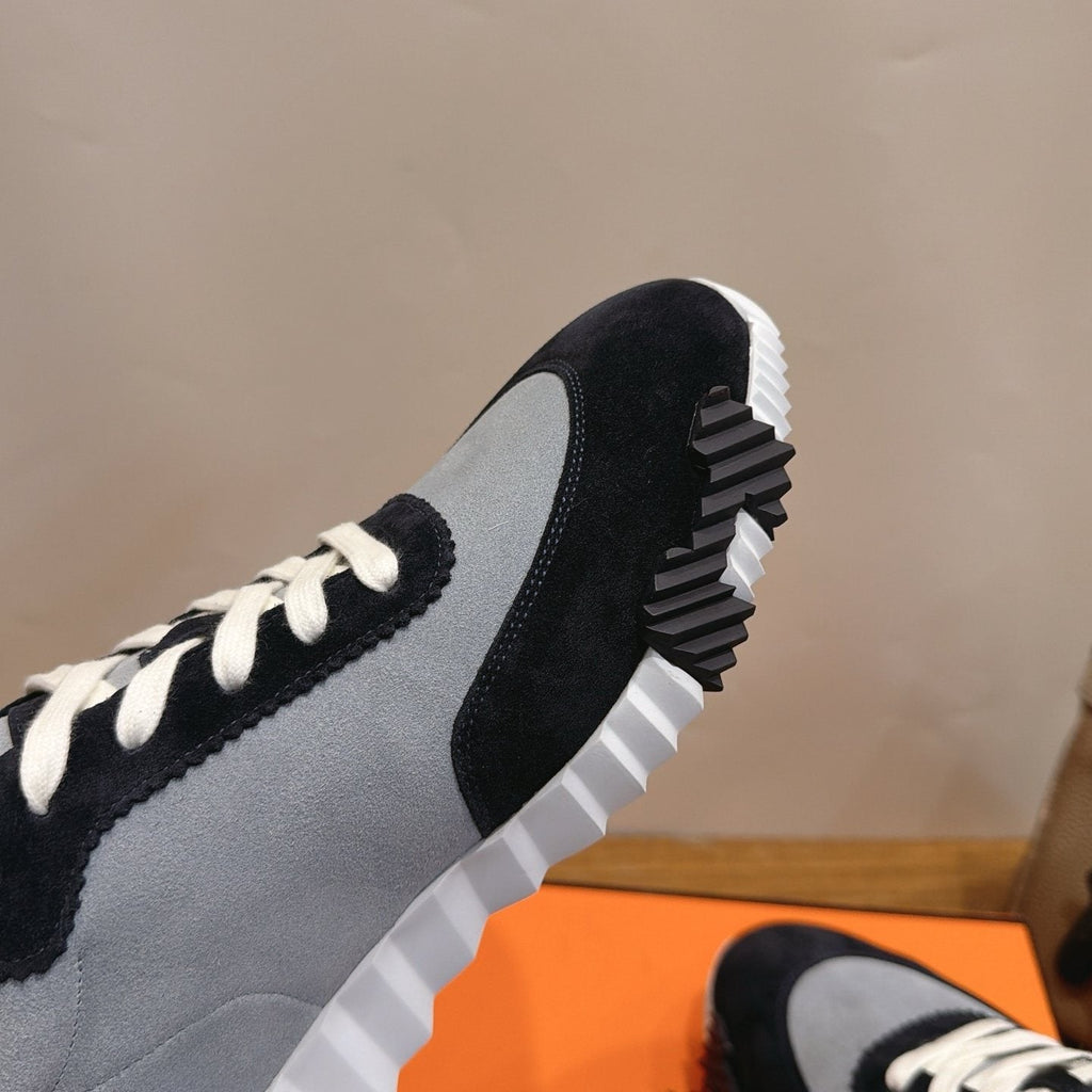 Hermès Paneled Low-Top Sneakers — detail
