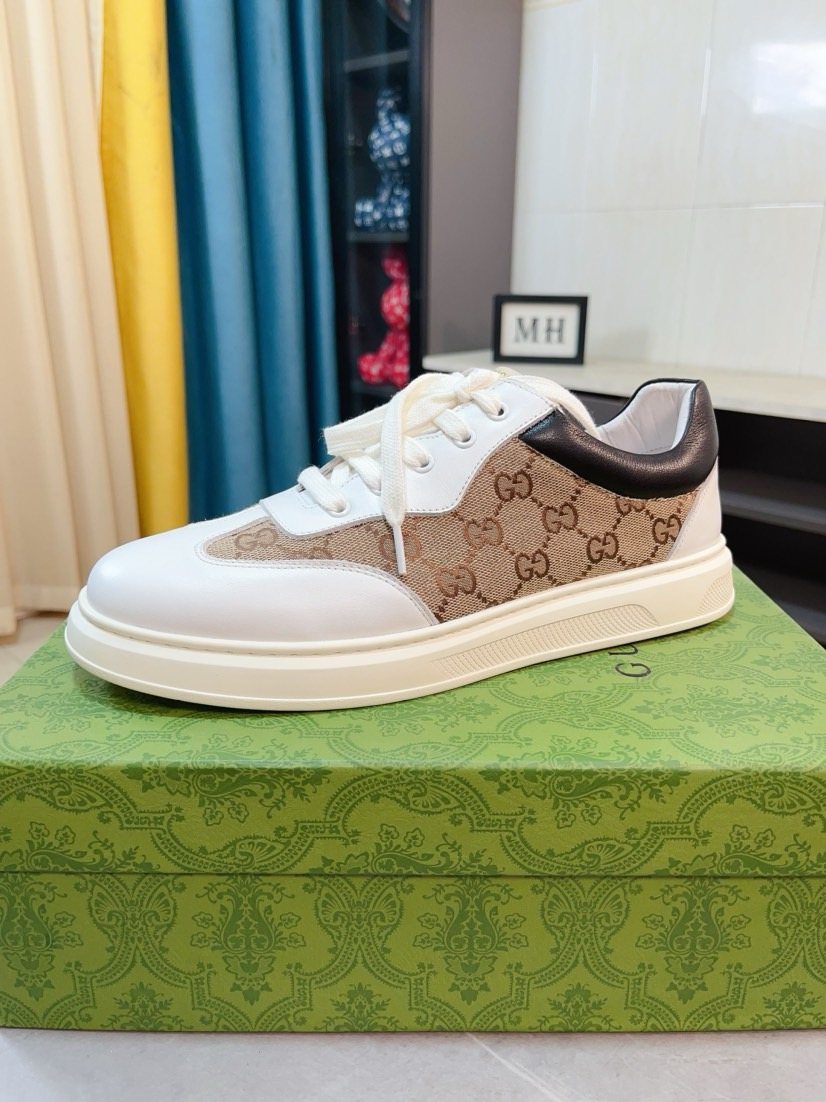 Gucci Embossed Low-Top Sneakers — model