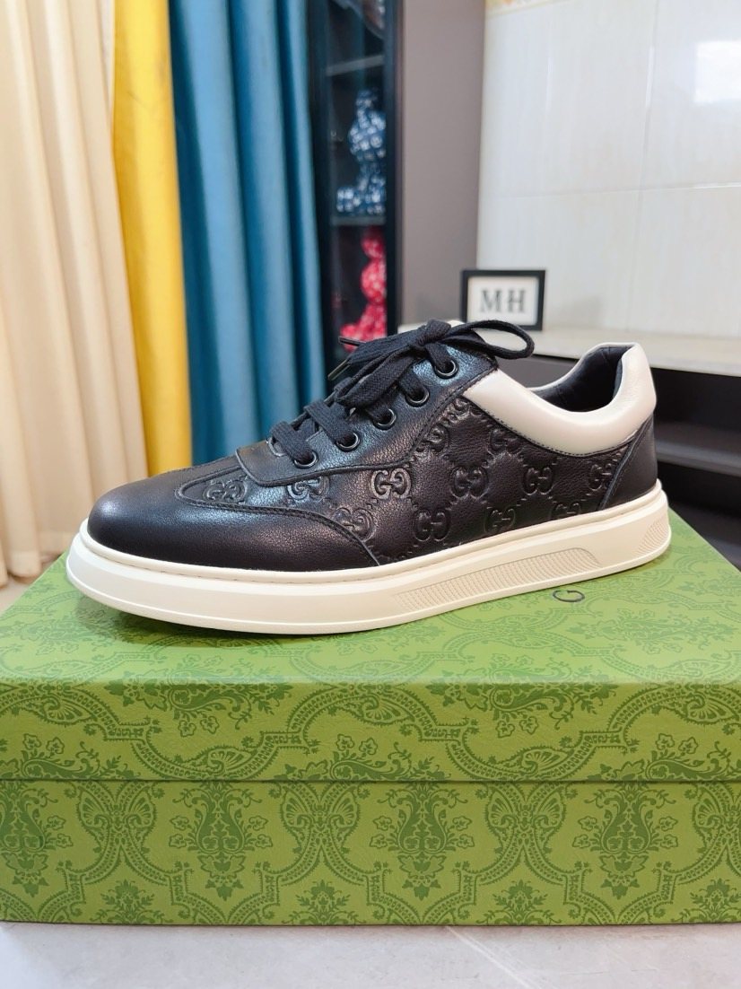 Gucci Embossed Low-Top Sneakers — front