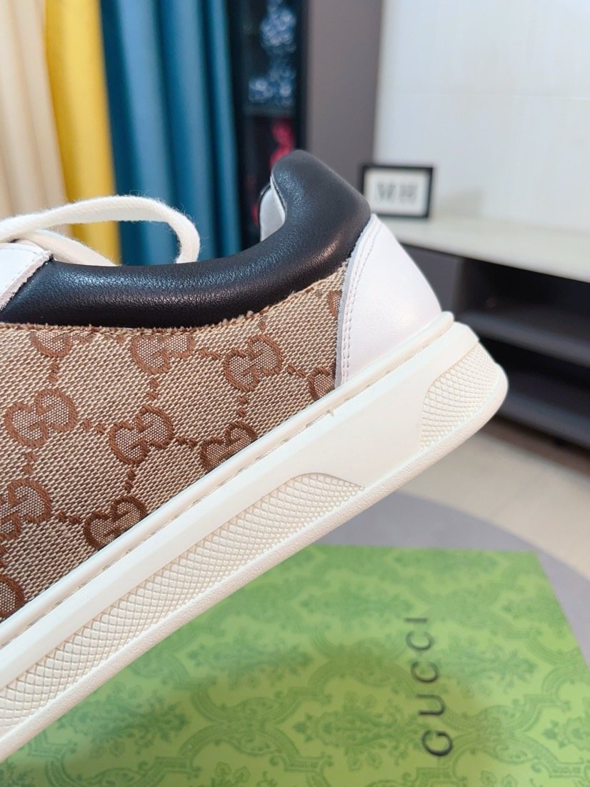 Gucci Embossed Low-Top Sneakers — side