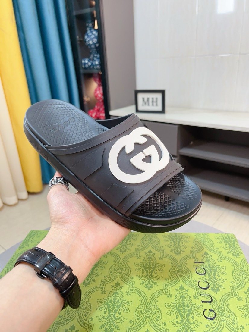 Gucci Emblem Slide Sandals — model