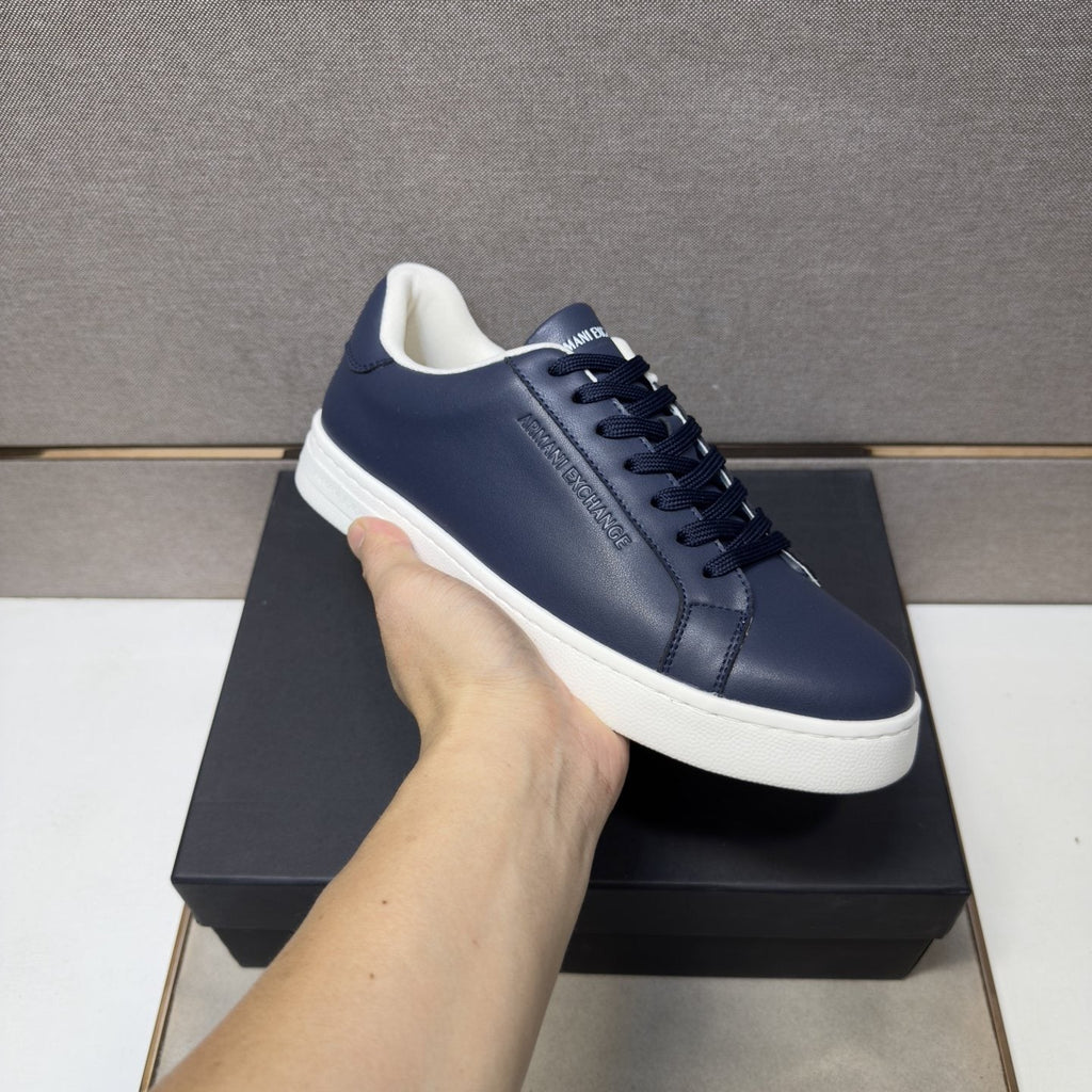 Armani Exchange Contrast Heel Low-Top Sneakers — model