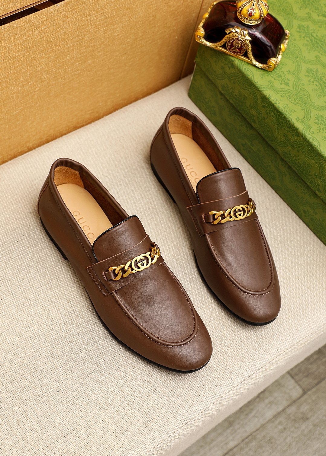 Gucci Leather Chain Loafers — front