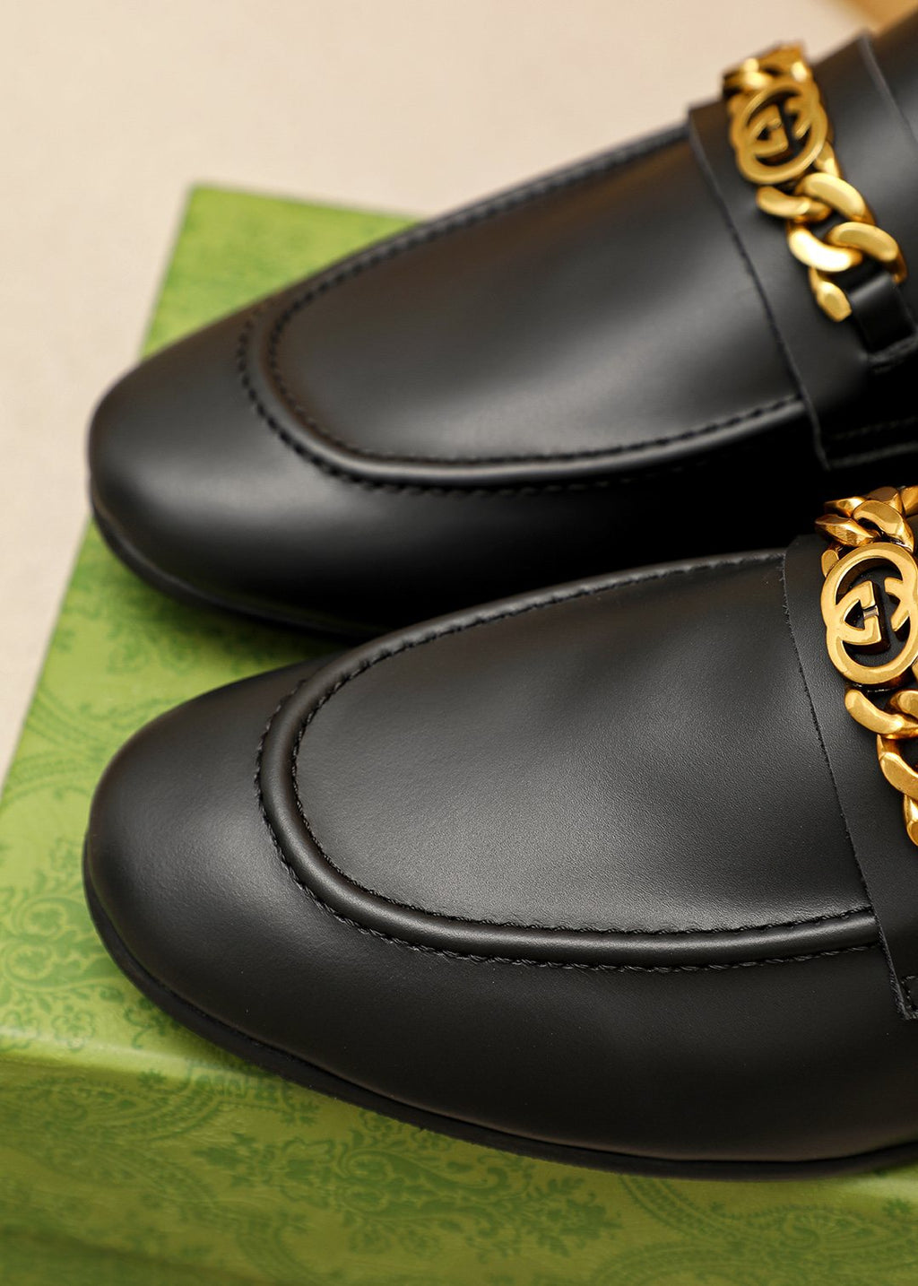 Gucci Leather Chain Loafers — detail