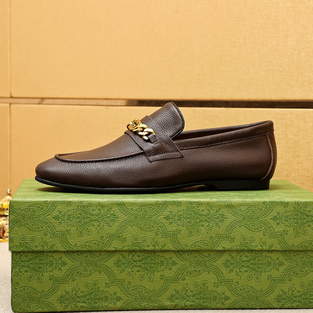Gucci Pebble Leather Loafers — side