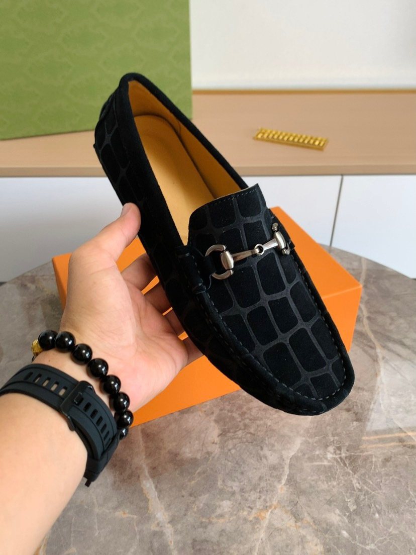 Gucci Textured Horsebit Loafers — model