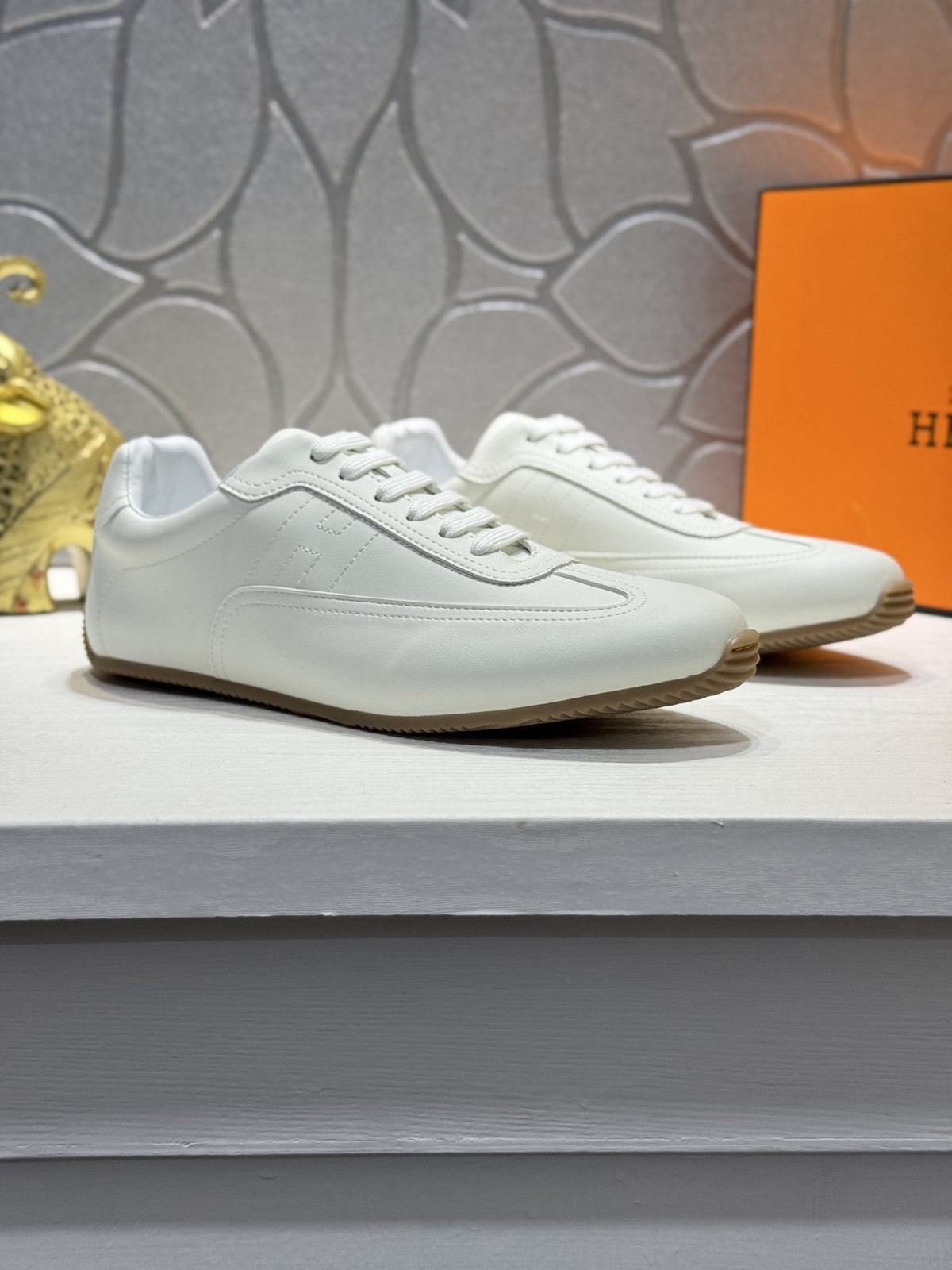 Hermès Contrast-Trim Low-Top Sneakers — front