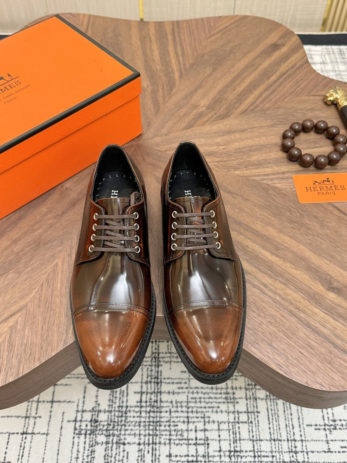 Hermès Polished Leather Lace-Up Dress Shoes — front