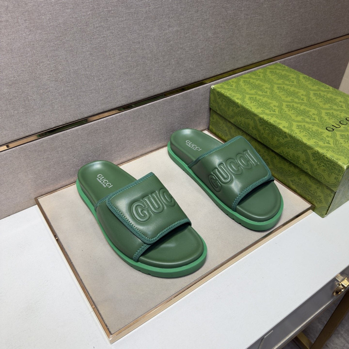 Gucci Raised Logo Slide Sandals — front