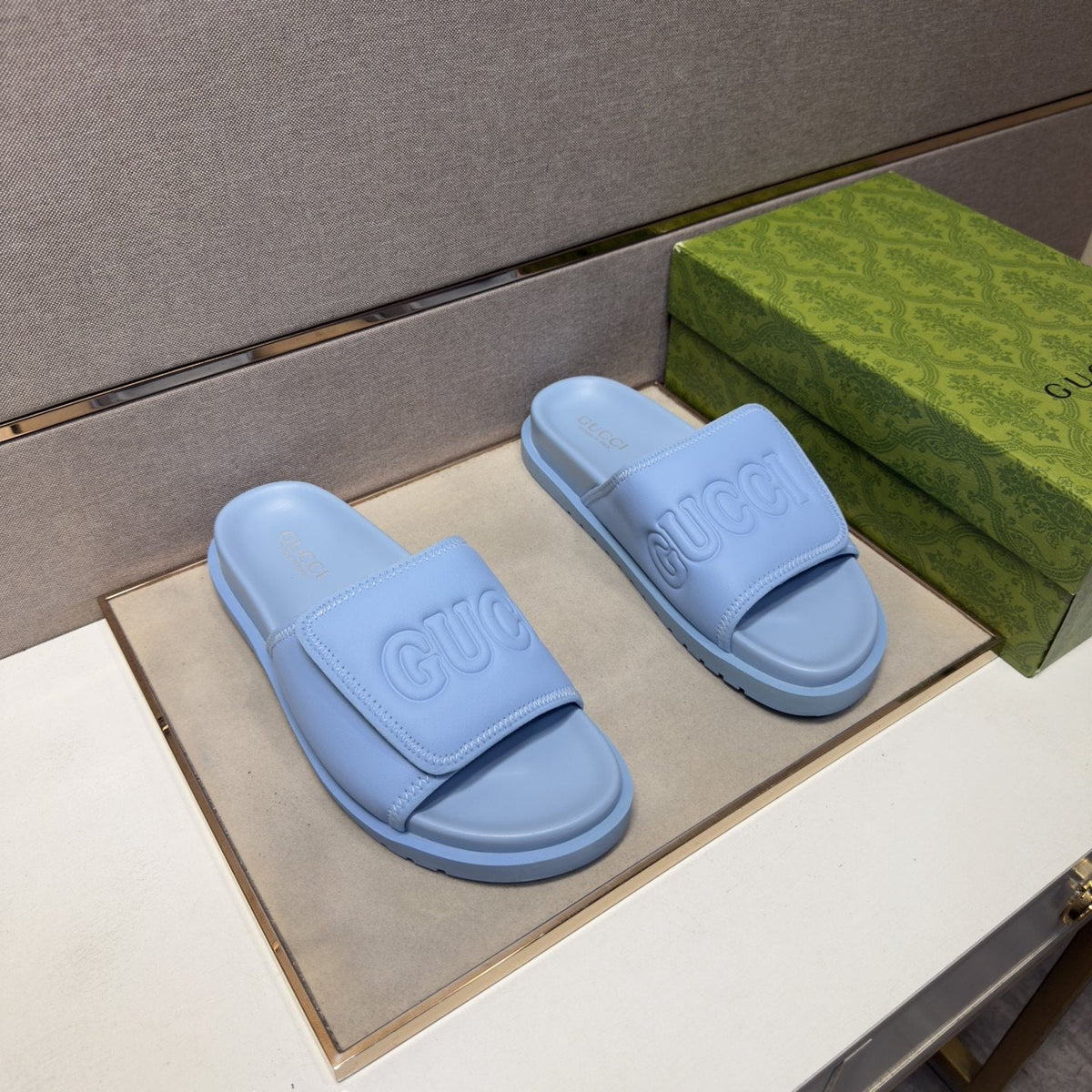 Gucci Raised Logo Slide Sandals — front