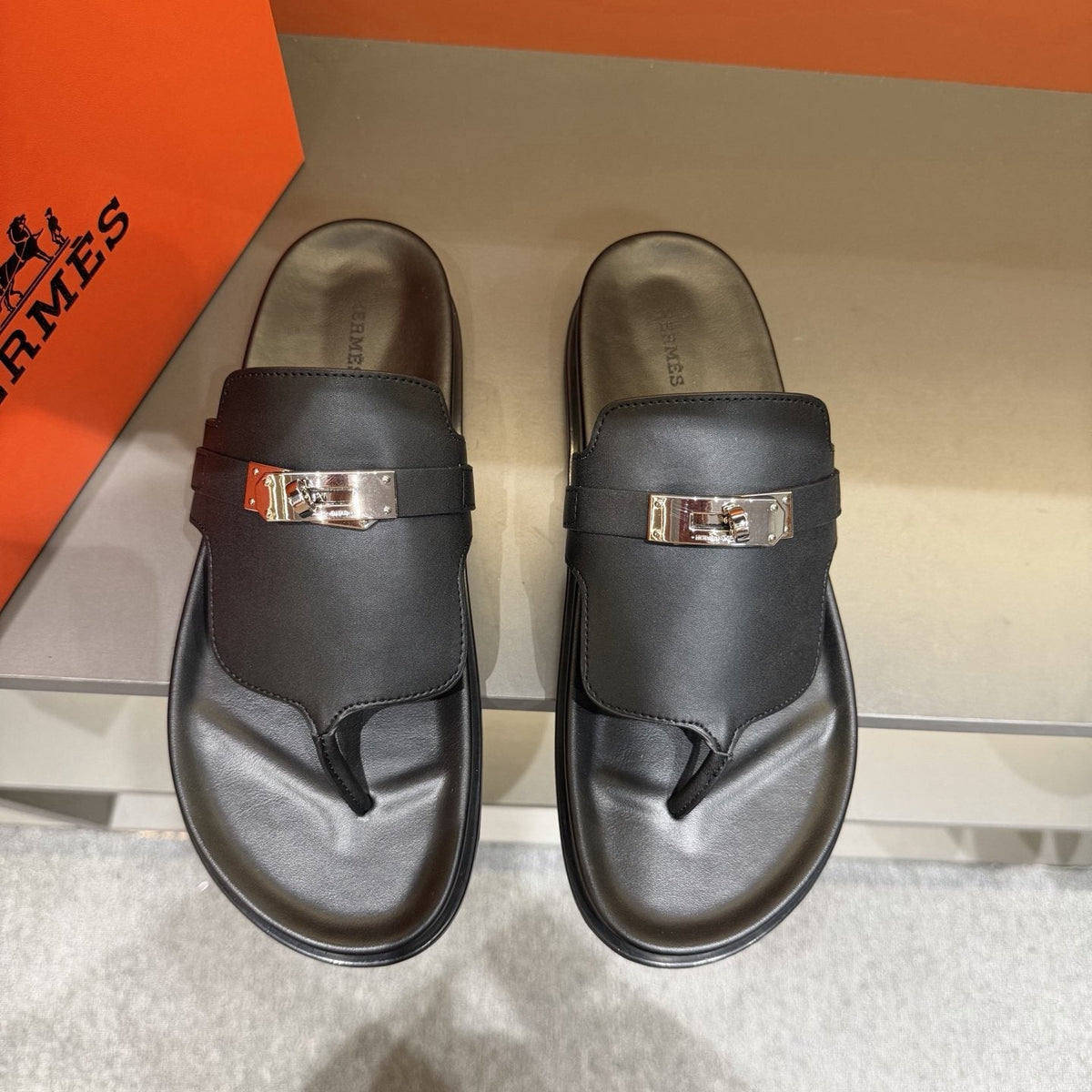 Hermès Metal-Hardware Thong Sandals — front