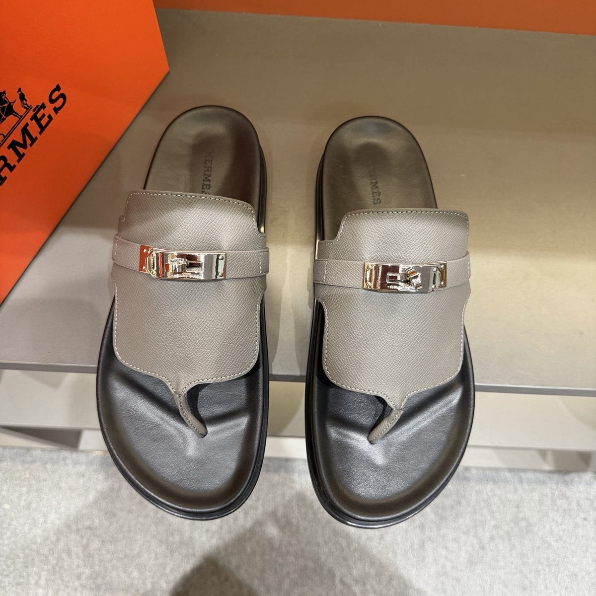 Hermès Metal-Hardware Thong Sandals — front