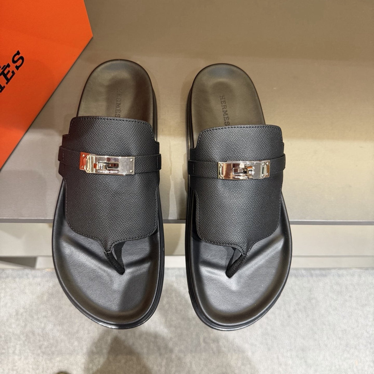 Hermès Metal-Hardware Thong Sandals — front