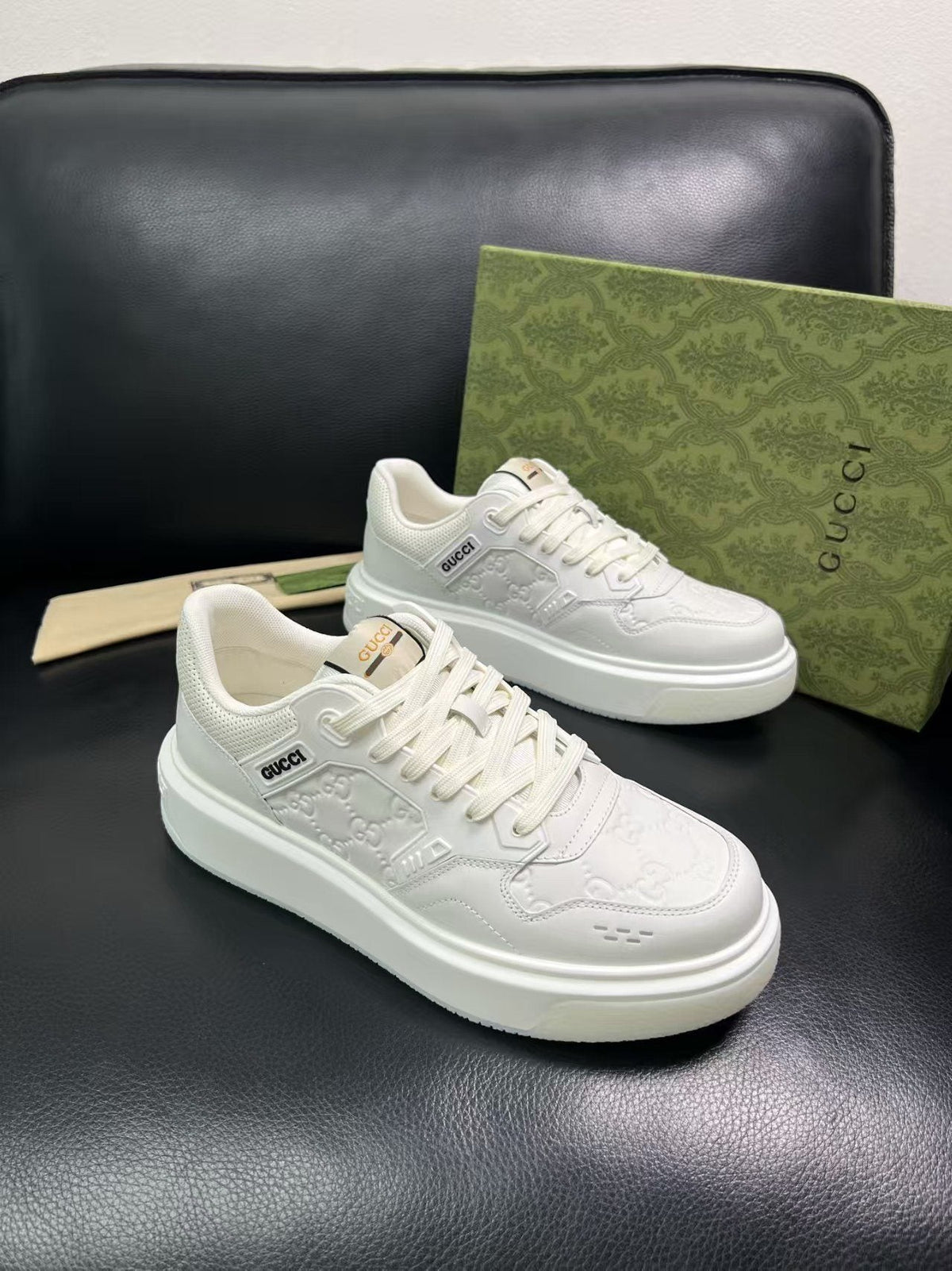 Gucci Embossed Low-Top Sneakers — front