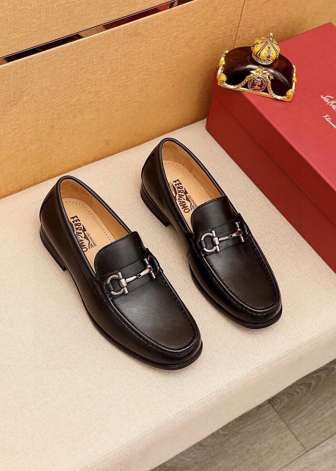 Ferragamo Black Buckle Loafers — hero