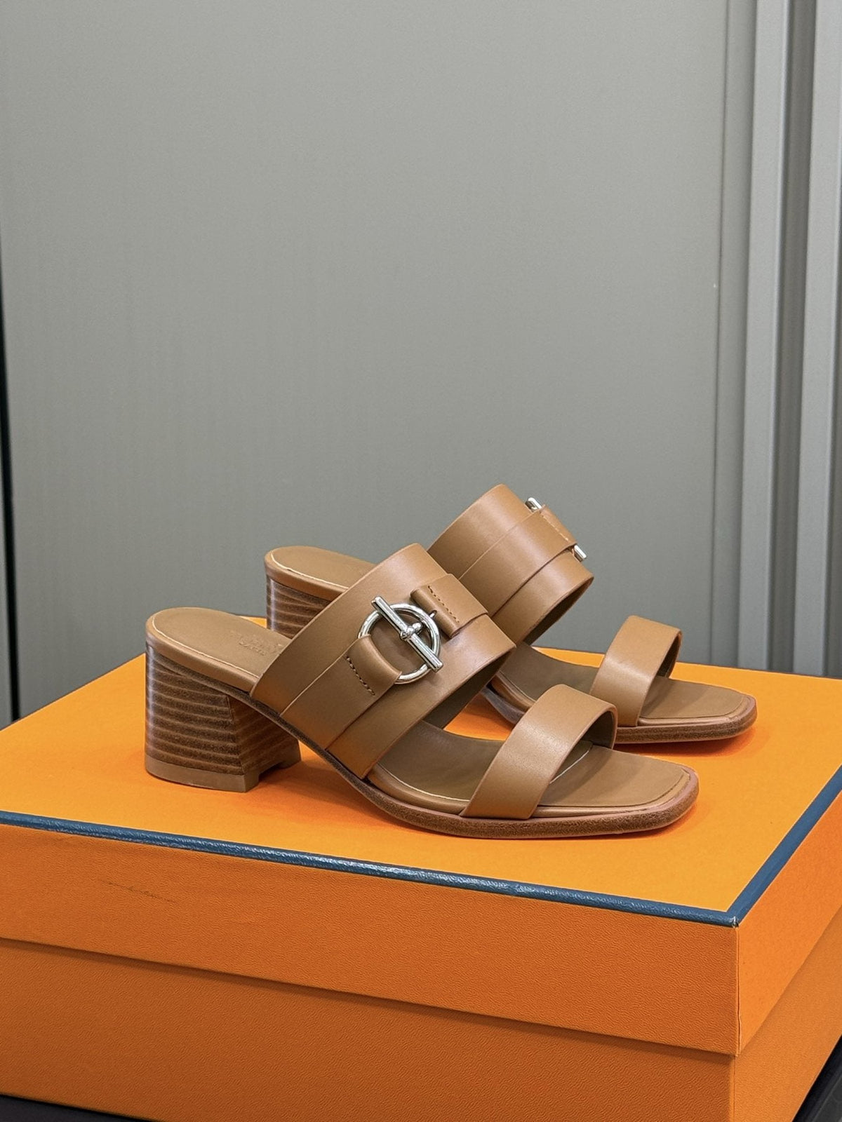 Hermès Kute Buckle Block-Heel Slide Sandals — front