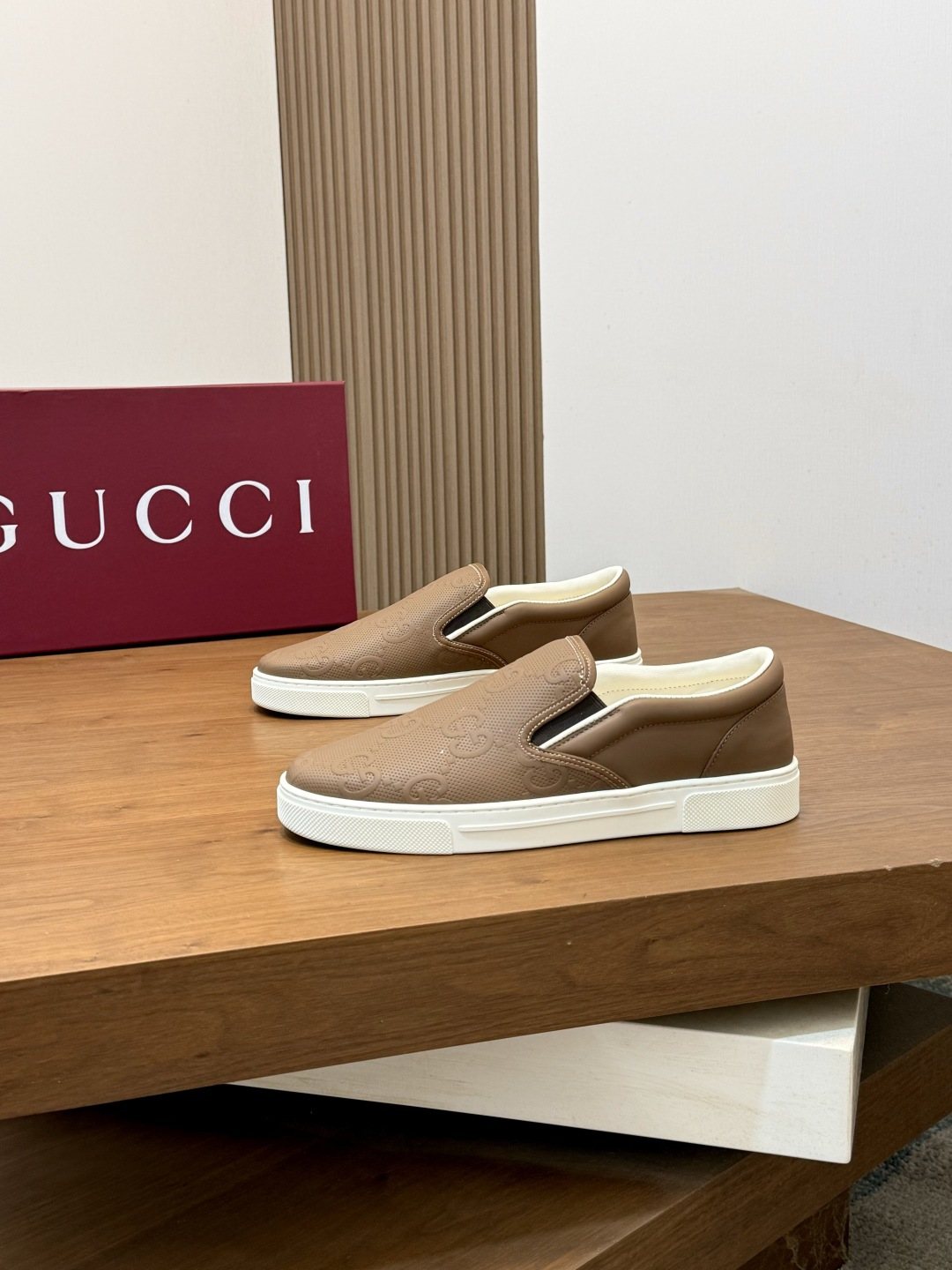 Gucci Embossed Slip-On Sneakers — hero