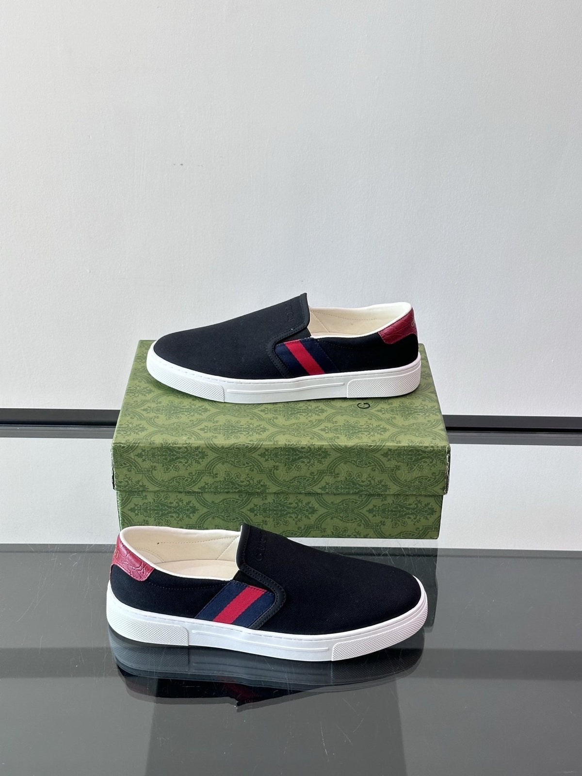 Gucci White Striped Slip-On Shoes — side
