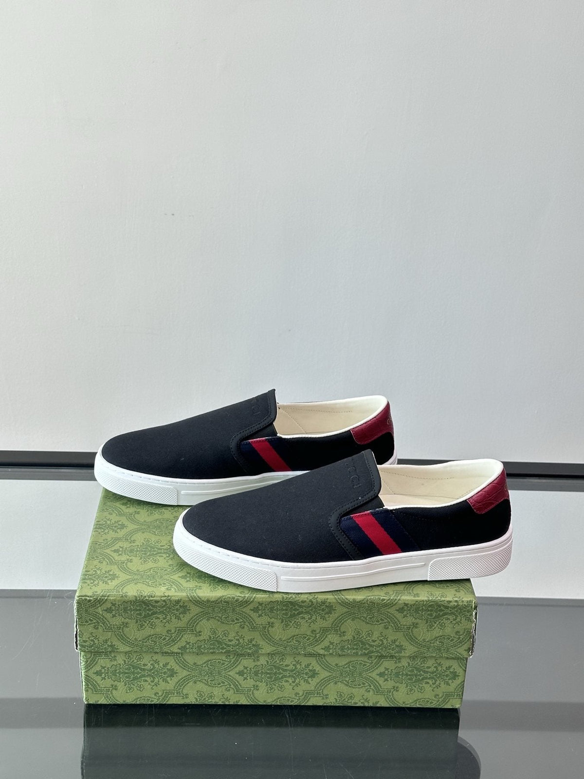 Gucci White Striped Slip-On Shoes — side